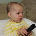 baby watching tv, baby holding Tv remote, Tv remote, baby, cute baby