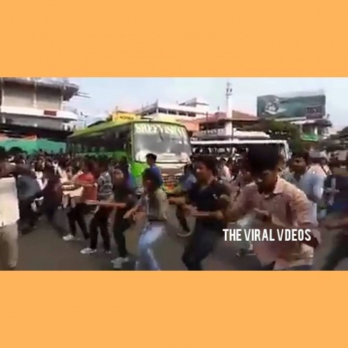 Angry Kerala Woman Thrashed A College Girl During Flash Mob At Bus Stop